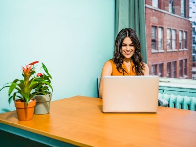 Woman Using Laptop.