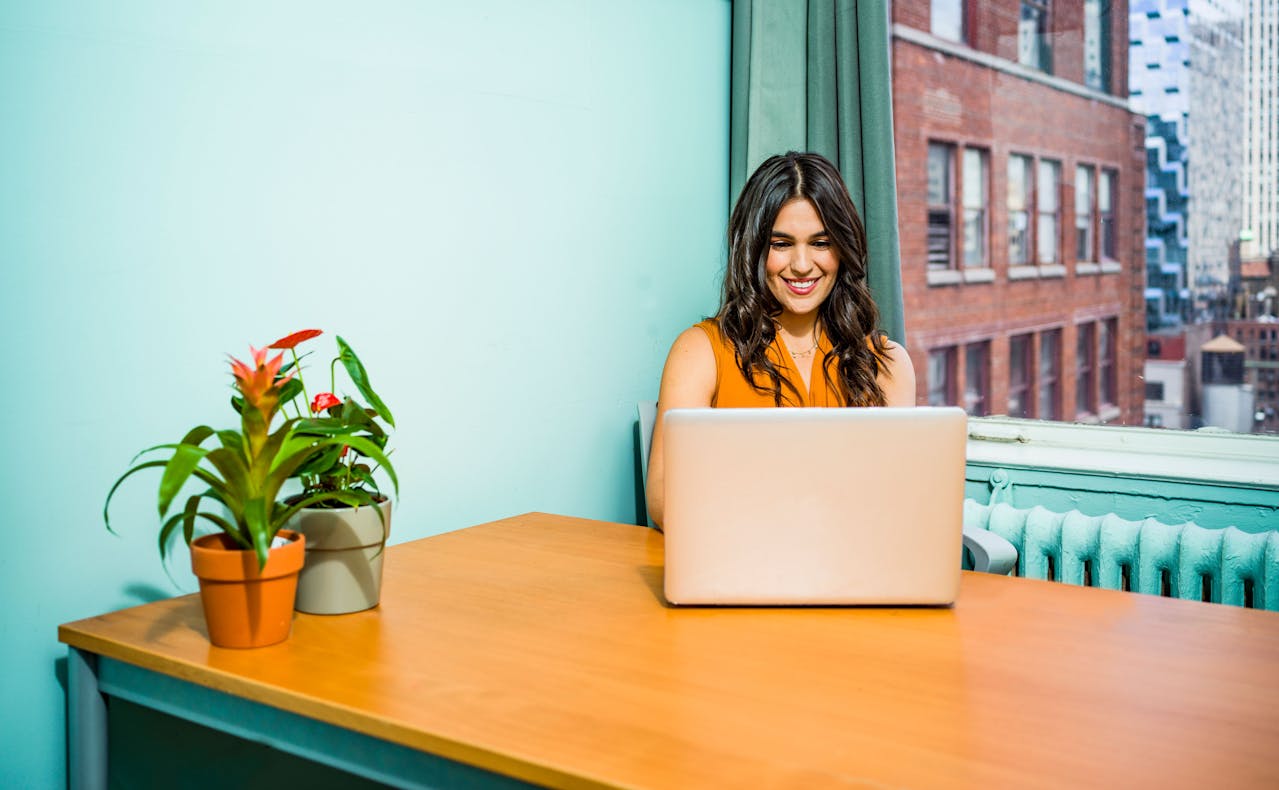 Woman Using Laptop.