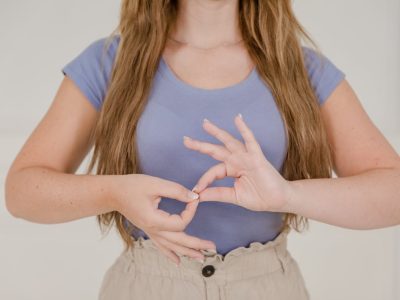 Close up on Woman's Hands while Using Sign Language for interpreter