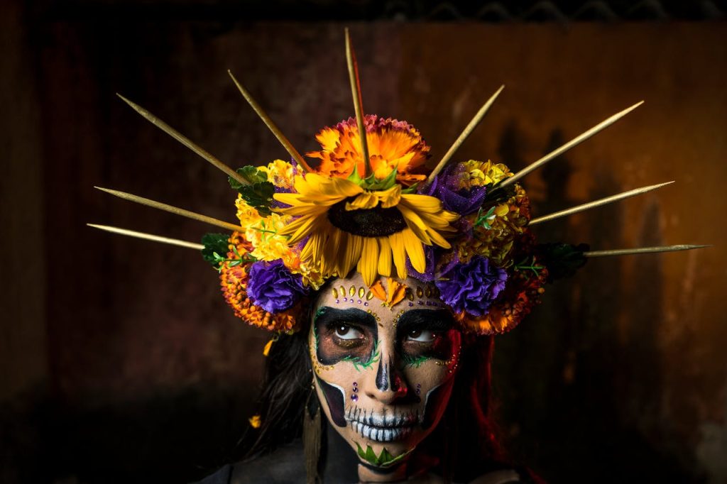 Woman in Traditional Dia de los Muertos Makeup.