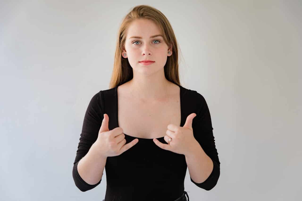 Portrait of Woman Showing Sign Language.