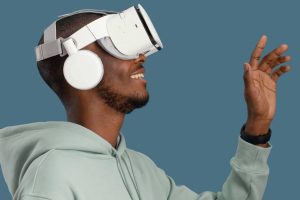 Side view of smiley man with virtual reality headset