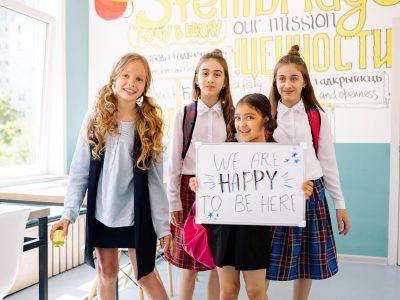 A Four Happy Girls in the Classroom
